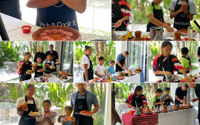 Participants preparing traditional Moroccan dishes at a Tangier cooking class on an organic farm.