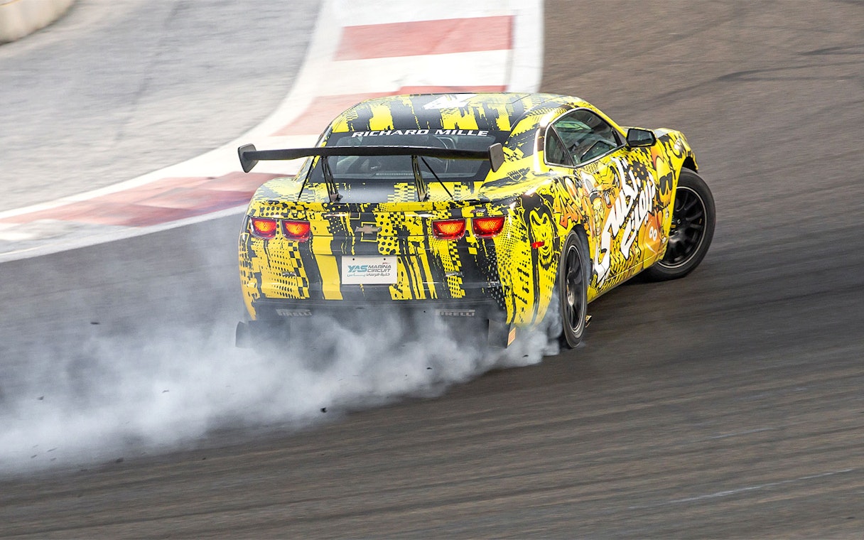Chevrolet drifting at Yas Marina Circuit during passenger experience.