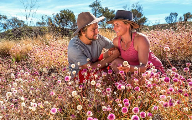 Couple enjoying wildflowers on Pinnacles Lobster Lavender Tour near Perth.