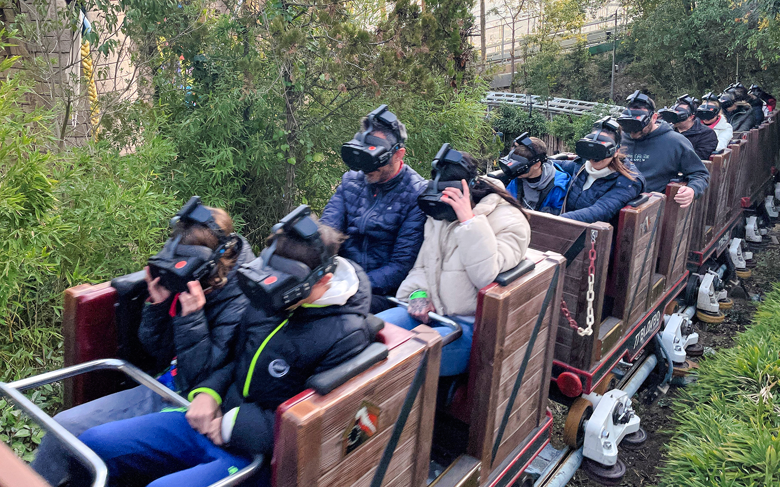 Visitors wearing VR headsets on Tibidabo Express ride in Barcelona.