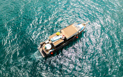 Phuket Private Longtail Boat Charter with Jacuzzi to Coral Island Banana Beach and Promthep Cape