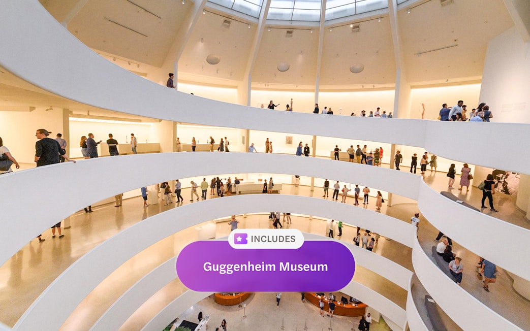 Visitors exploring the spiral interior of the Guggenheim Museum in New York.