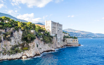 Monaco Oceanographic Museum on cliffside during boat tour.