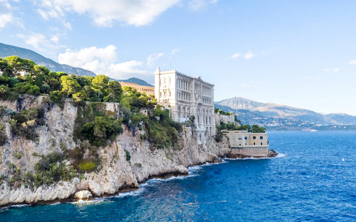 Monaco Oceanographic Museum on cliffside during boat tour.
