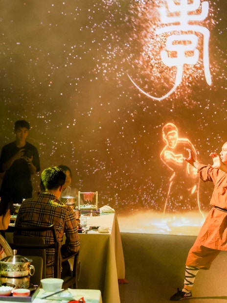 Kung fu artist performing at TASTE OF CHINA Immersive Restaurant, Shanghai.