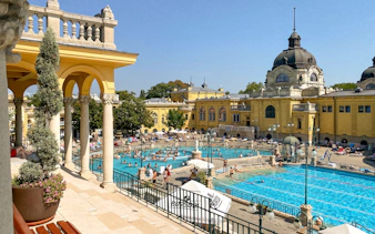 Szechenyi Baths outdoor pools with historic architecture in Budapest, Hungary.