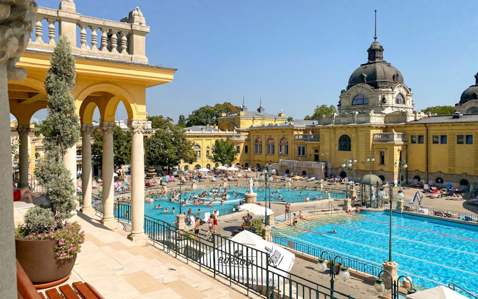 Szechenyi Baths outdoor pools with historic architecture in Budapest, Hungary.