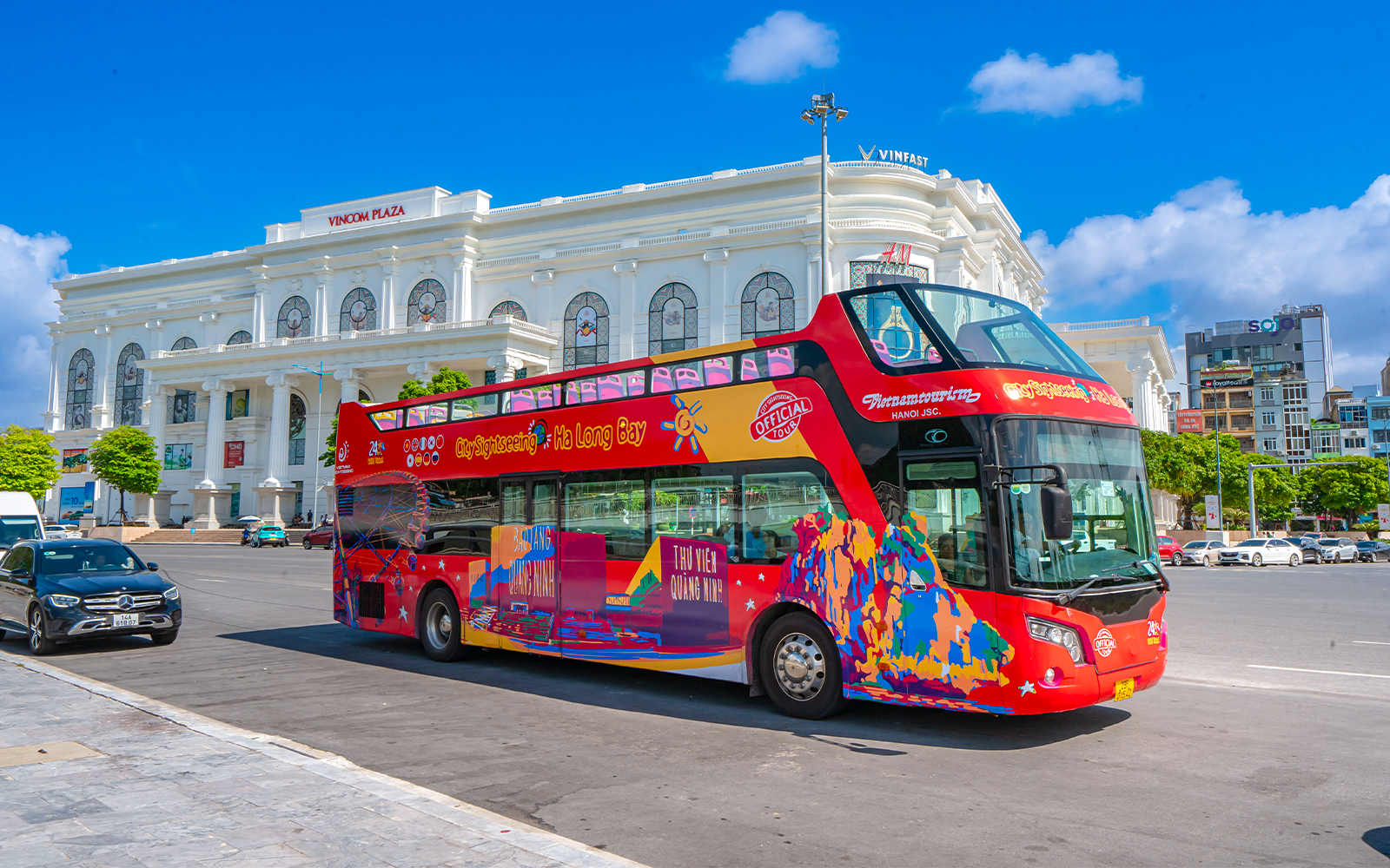 Hop-On Hop-Off bus in front of Vincom Plaza, Ha Long Bay.