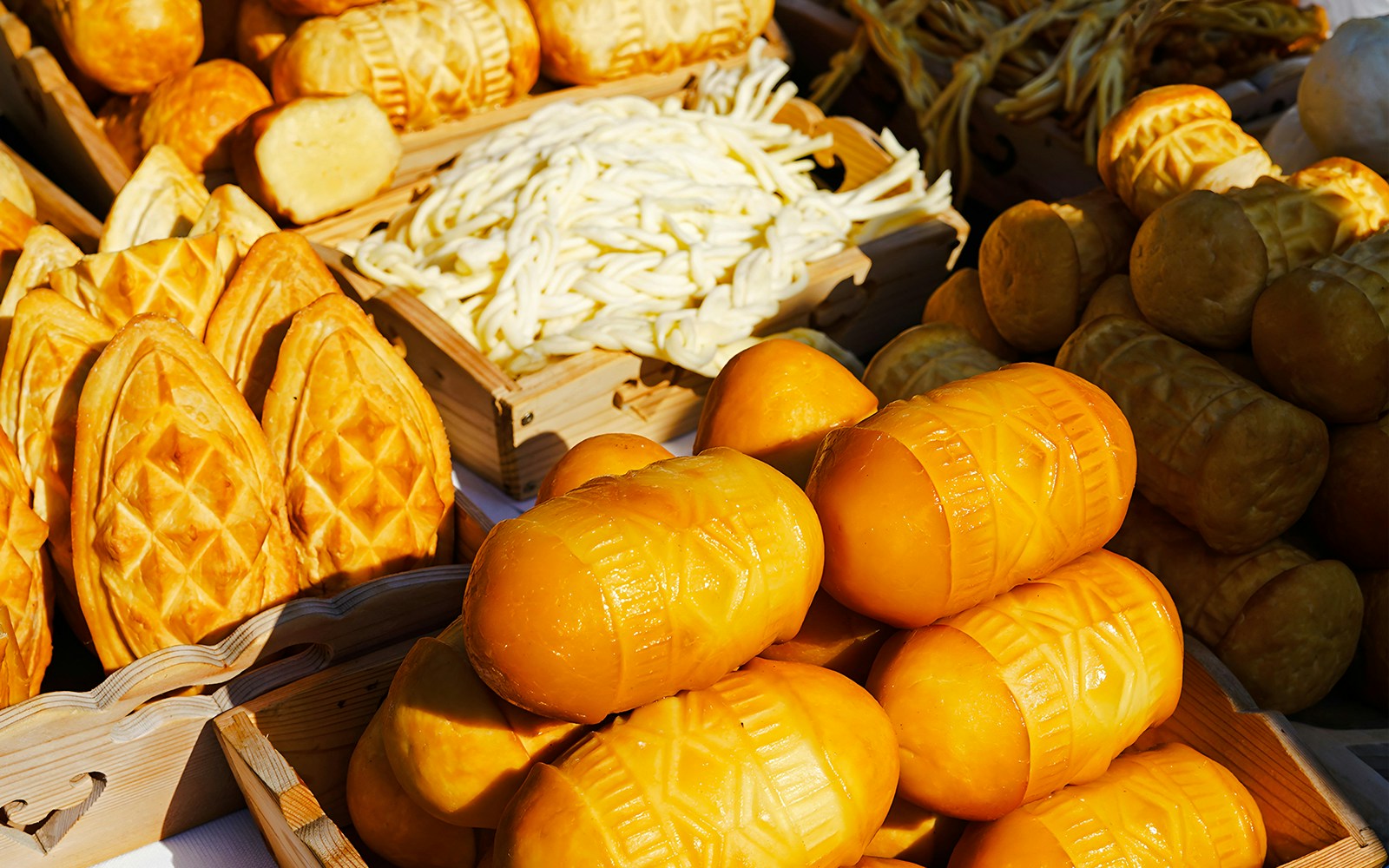 Oscypek cheese display at a market in Zakopane, Poland.