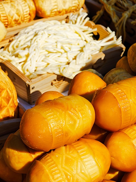 Oscypek cheese display at a market in Zakopane, Poland.