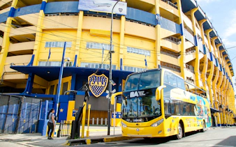 Double-decker bus in front of La Bombonera stadium, Buenos Aires.