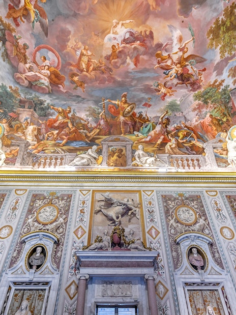 Borghese Gallery ceiling frescoes depicting mythological scenes in Rome, Italy.