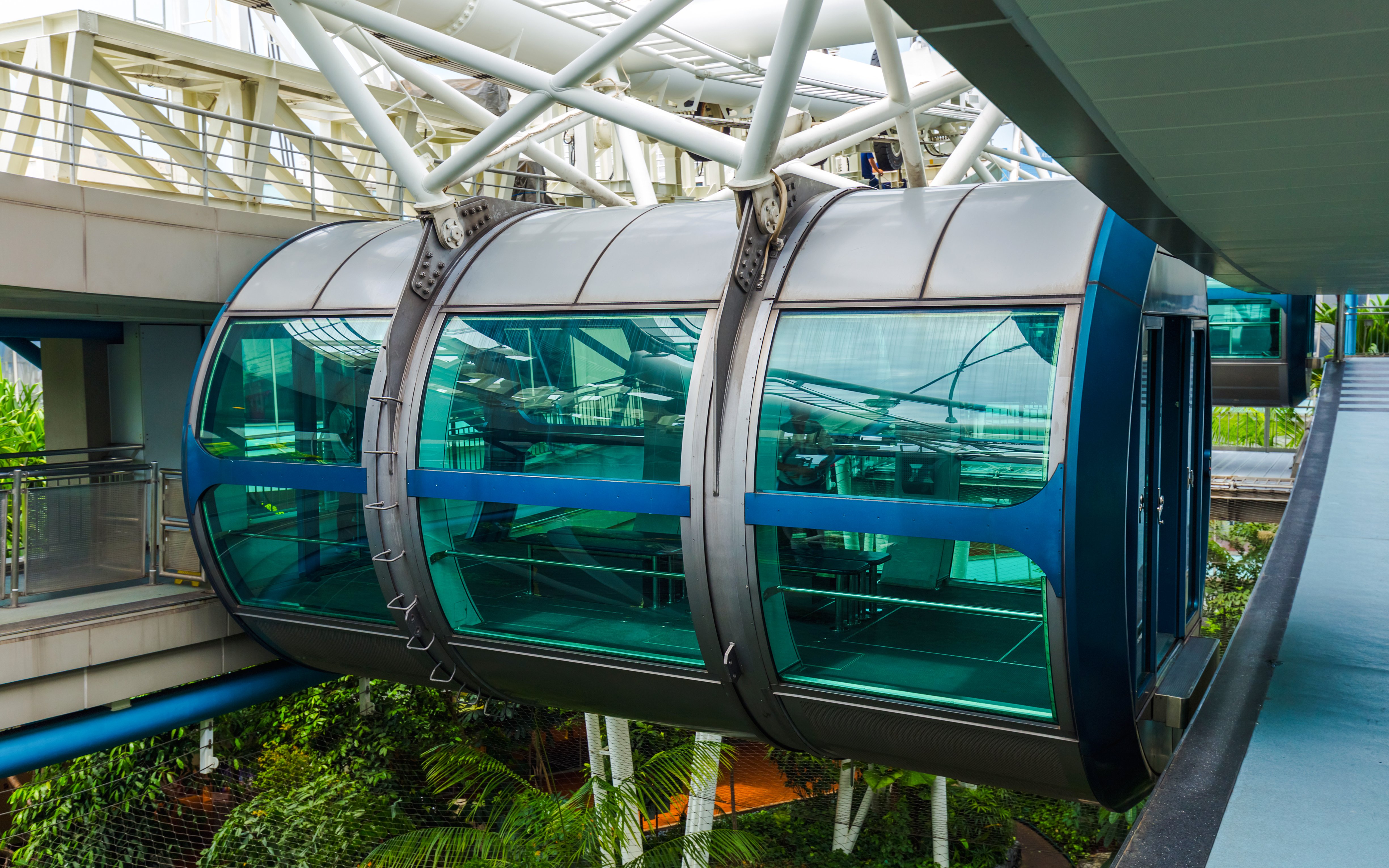 Singapore Flyer cabin with glass windows and metal framework.