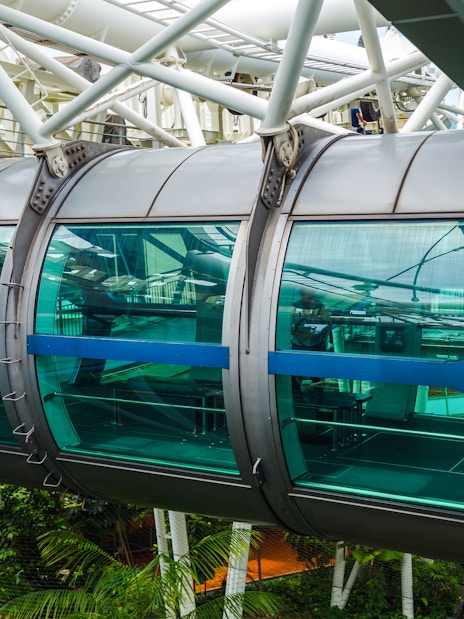 Singapore Flyer cabin with glass windows and metal framework.