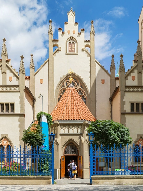Prague Jewish Museum entrance with visitors, part of the Prague Card tour.