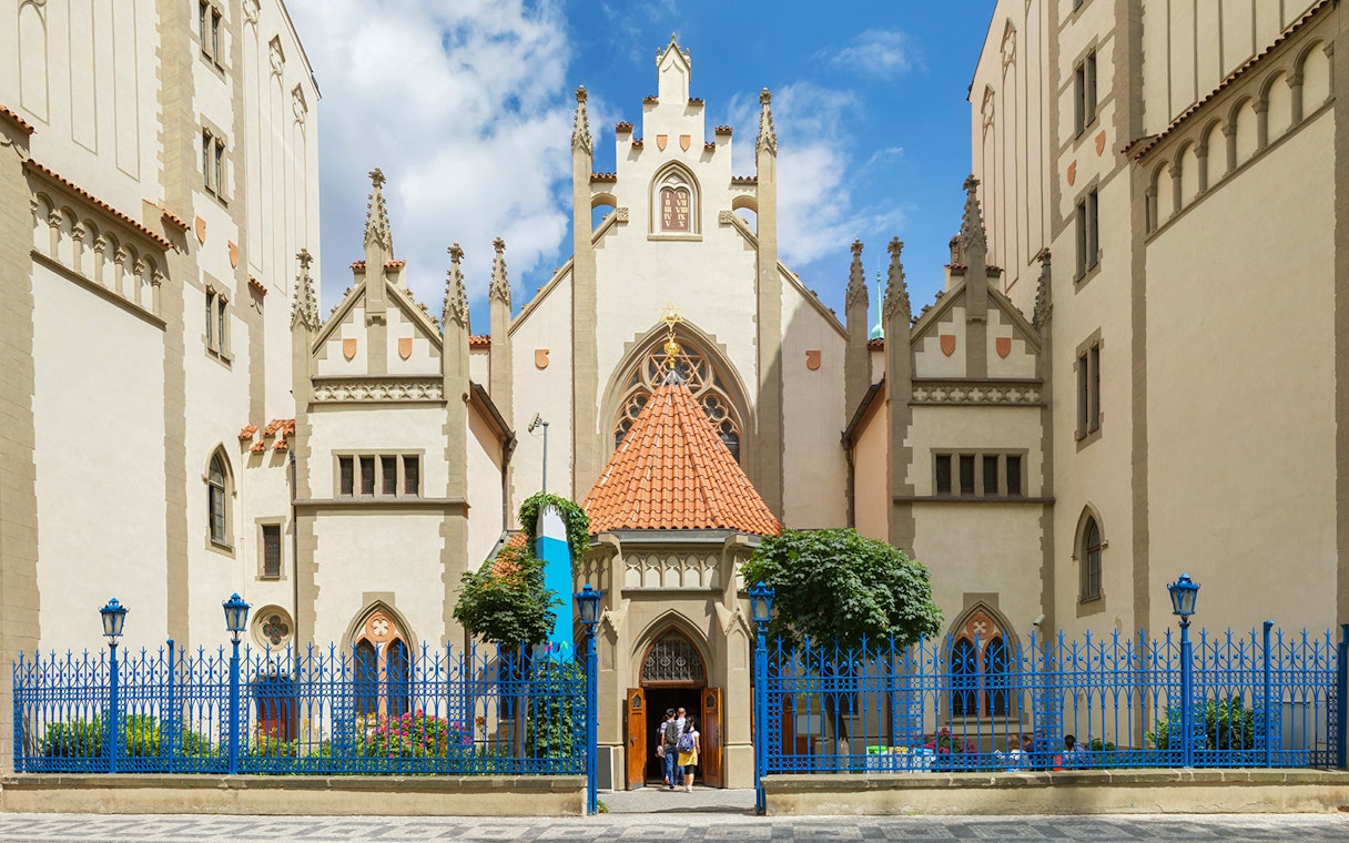 Prague Jewish Museum entrance with visitors, part of the Prague Card tour.