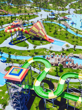 Aerial view of colorful water slides at Vinwonders Nam Hoi An, Vietnam.