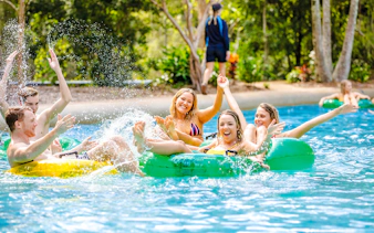 People enjoying a water ride at Calypso Bay, Wet n Wild, Gold Coast water park.
