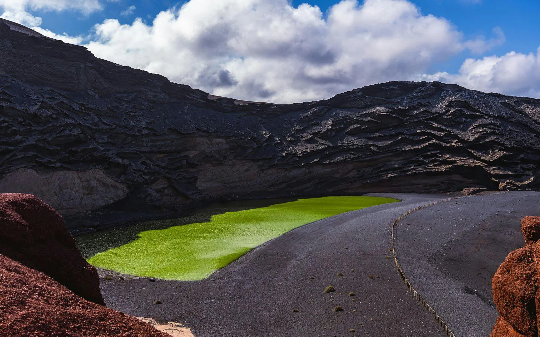 Charco de los Clicos green lagoon with volcanic cliffs, Lanzarote, Canary Islands, Spain.
