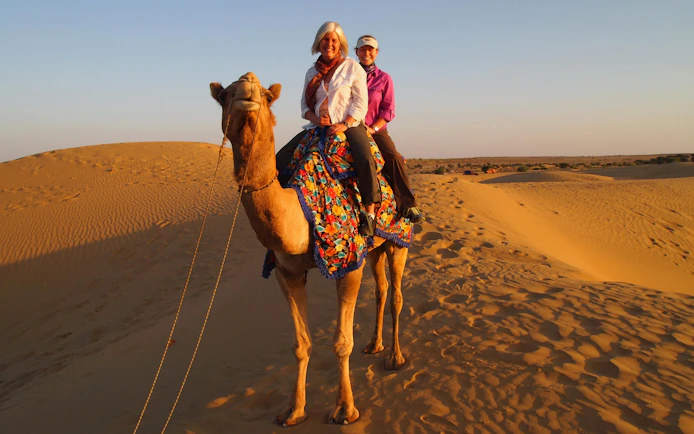 Camel ride in Agadir desert along Souss River.