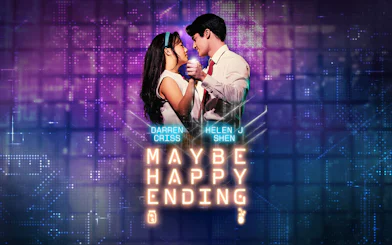 Couple dancing with 'Maybe Happy Ending' Broadway show title in neon lights.