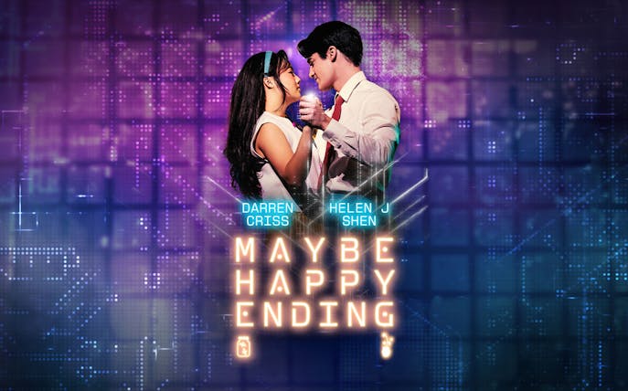 Couple dancing with 'Maybe Happy Ending' Broadway show title in neon lights.