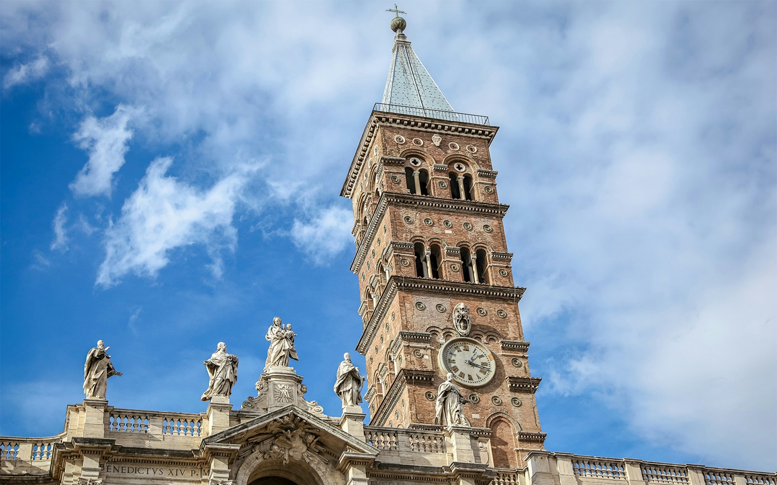 Santa Maria Maggiore Bell Tower in Rome, Italy, showcasing intricate architectural details.
