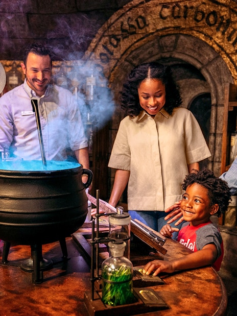 Family enjoying a magical potion-making experience in Los Angeles with Go City Explorer Pass.