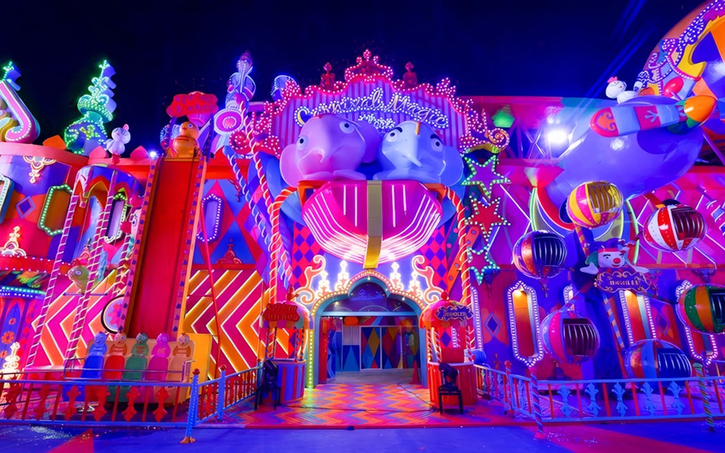 Carnival Magic entrance with vibrant lights and decorations in Phuket.