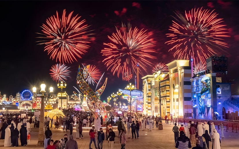Fireworks display over Global Village Dubai during New Year's Eve celebration.