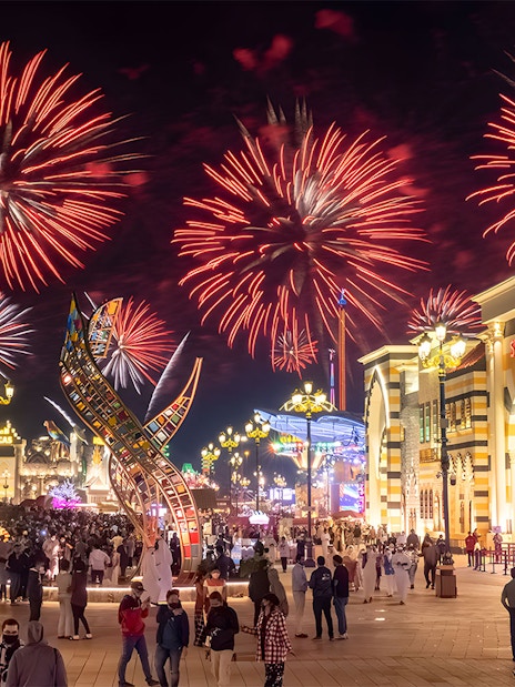 Fireworks display over Global Village Dubai during New Year's Eve celebration.