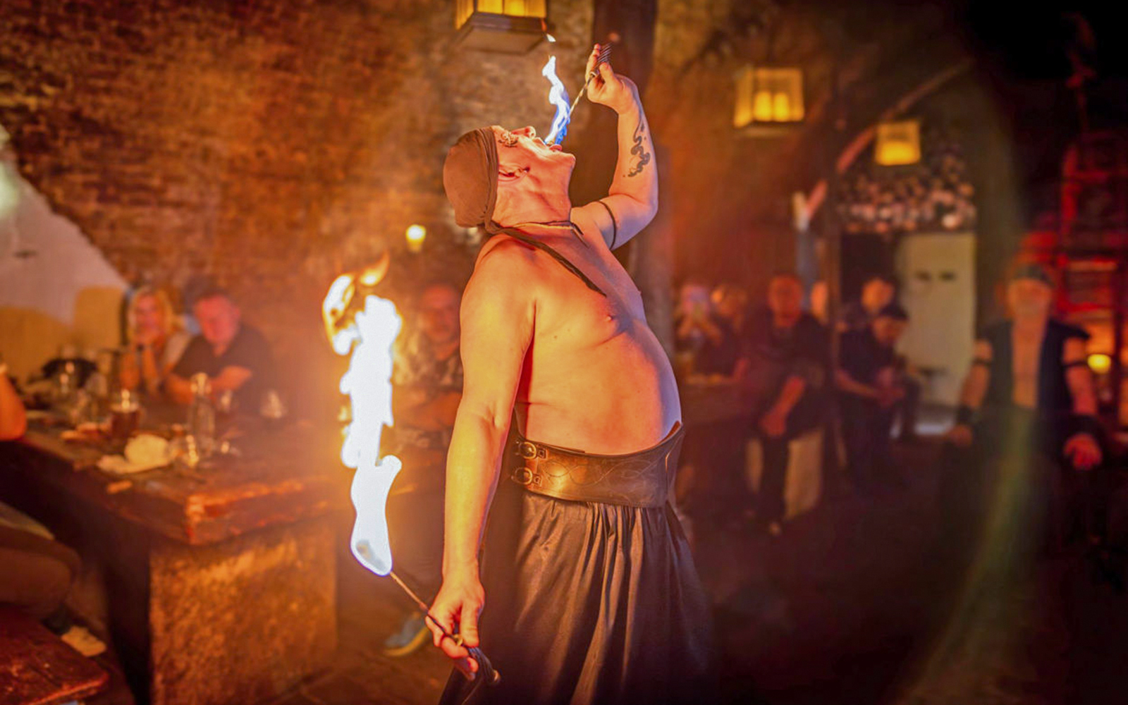 Fire performer at medieval dinner show in Dětenice, near Prague.