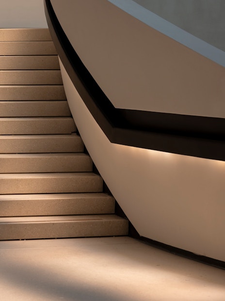 Staircase inside Zayed National Museum with modern design elements.
