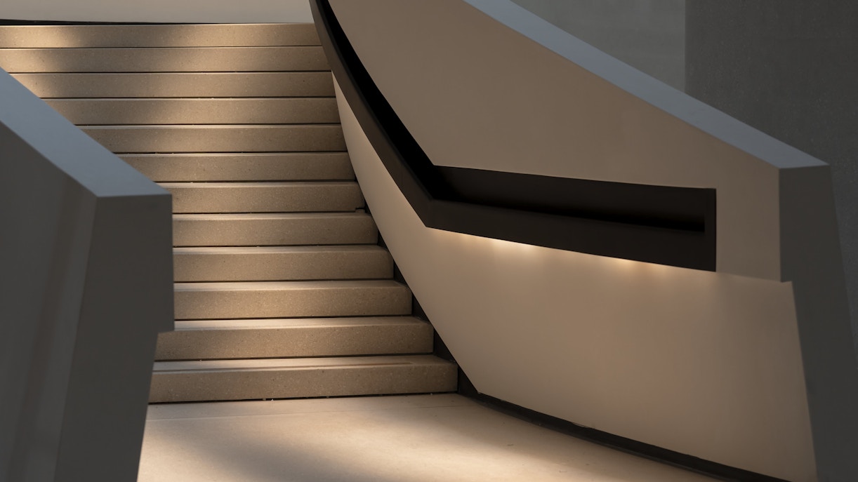 Staircase inside Zayed National Museum with modern design elements.