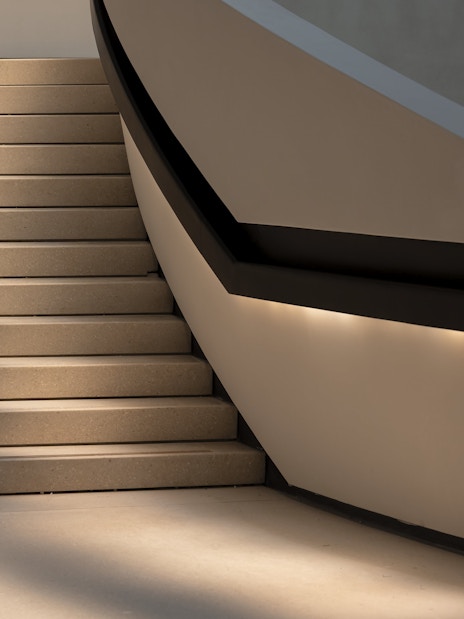 Staircase inside Zayed National Museum with modern design elements.