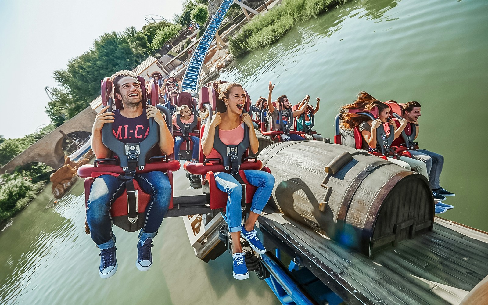 Tourists on a thrilling furius baco roller coaster ride at PortAventura Park, Spain.