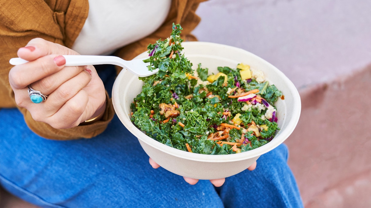women eating salad in zoo kiosk