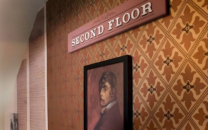 Second floor sign and portrait at Jack the Ripper Museum, London.
