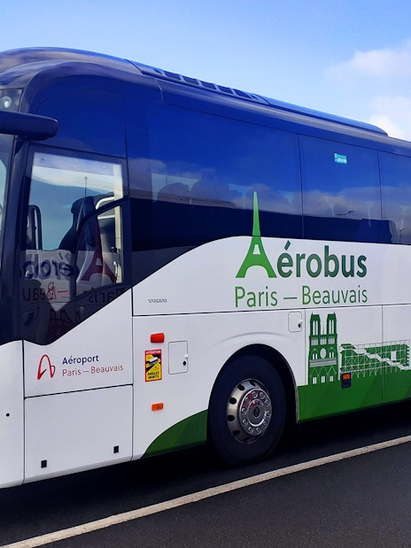 Aerobus parked at Paris Beauvais Airport for transfer to Saint-Denis University.