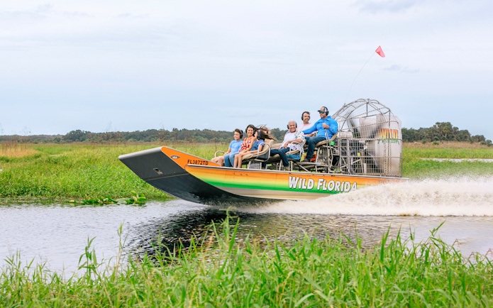 Guests on an airboat tour in the Everglades, Florida.