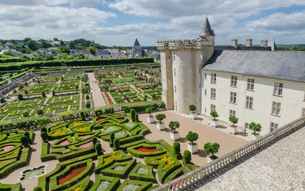 Aerial view of Chateau de Villandry gardens with intricate geometric patterns, France.