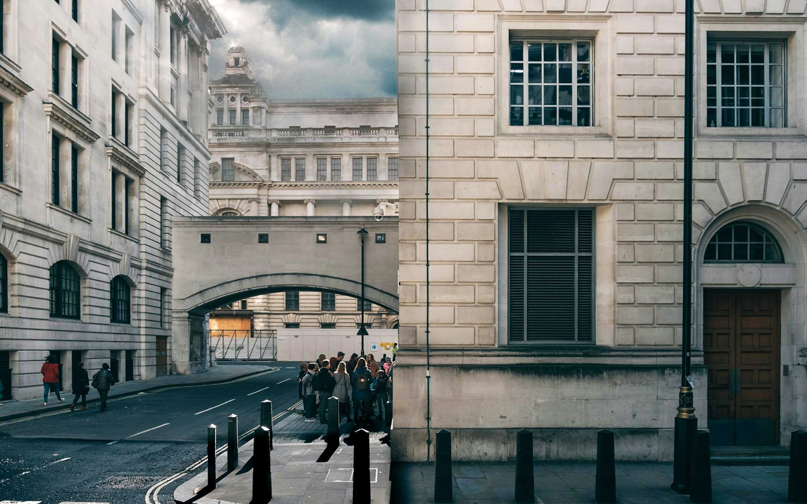 Tour group exploring Harry Potter film locations near Millennium Bridge, London.