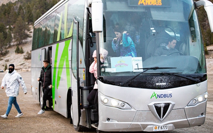 Tourists disembarking from a bus in Andorra la Vella.