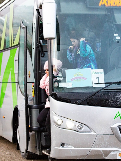 Tourists disembarking from a bus in Andorra la Vella.