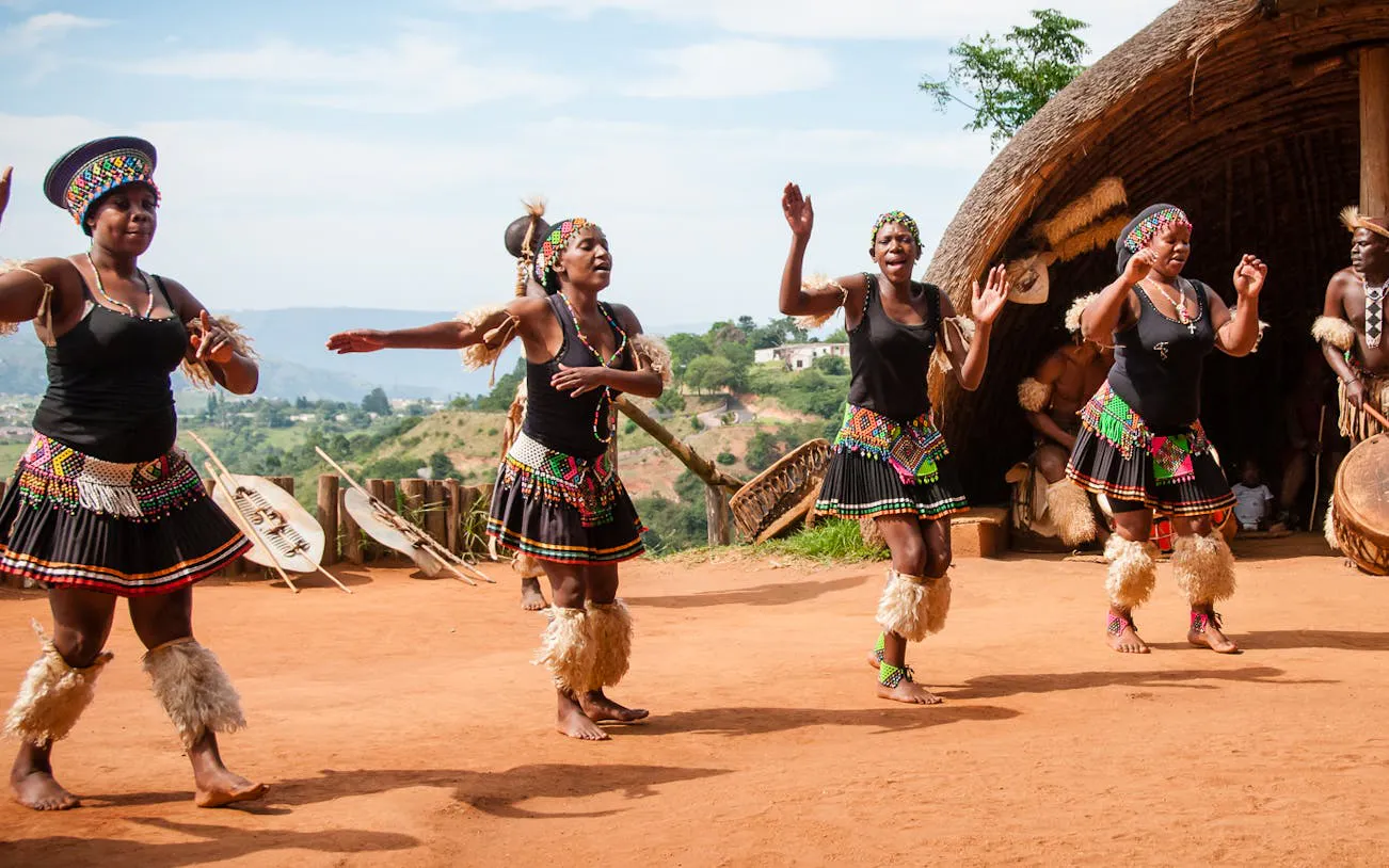 Zulu dancers performing at PheZulu Cultural Village, South Africa.