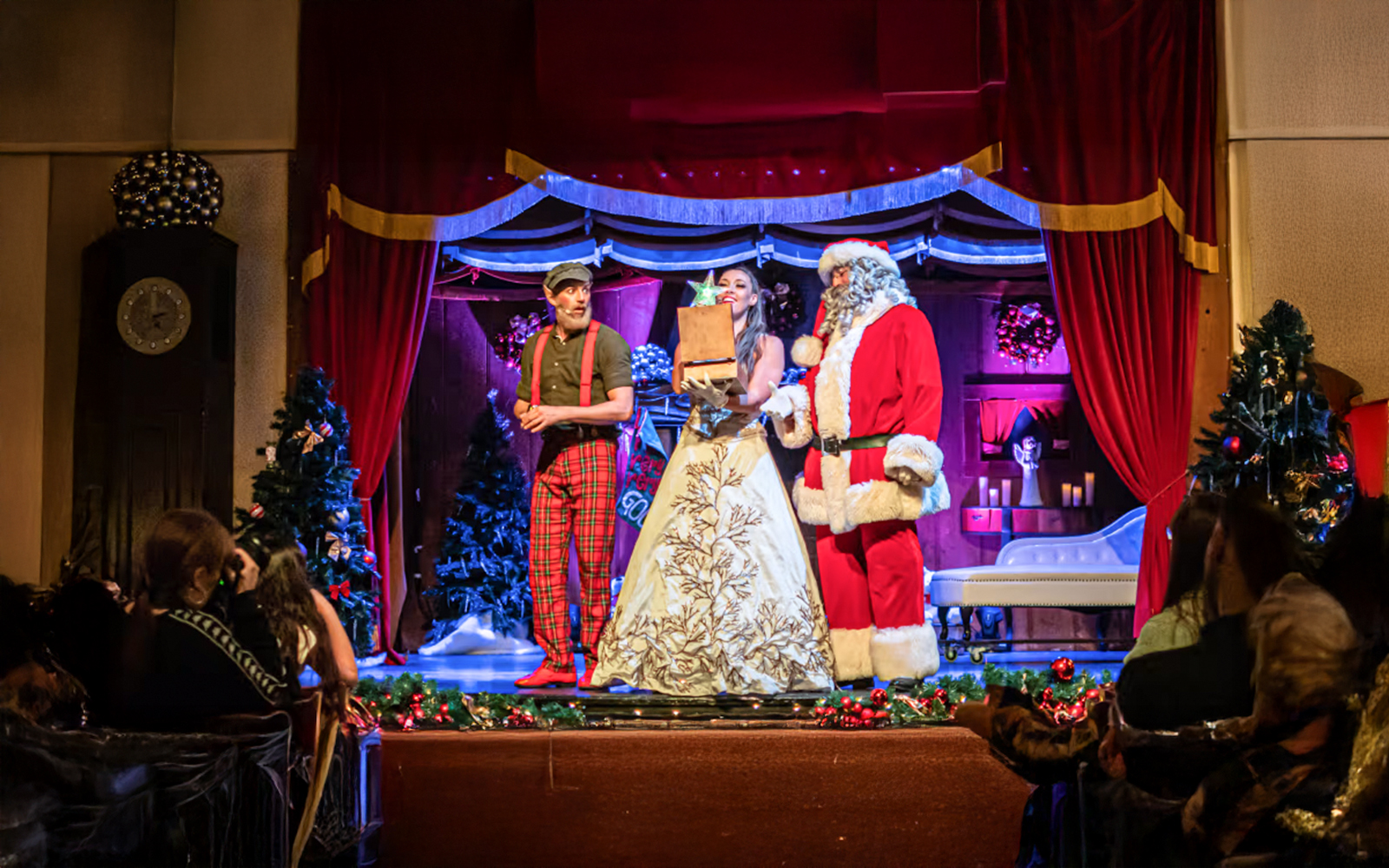 People dressed up as Santa Claus, and a wizard gnome