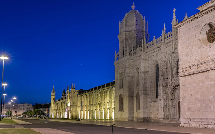 Jerónimos Monastery illuminated at night, Lisbon, Portugal.