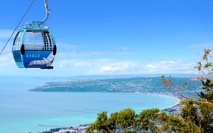 Arthurs Seat Eagle gondola overlooking Mornington Peninsula coastline.
