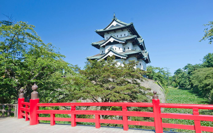 Hirosaki Castle with red bridge in Aomori Prefecture, Tohoku, Japan.