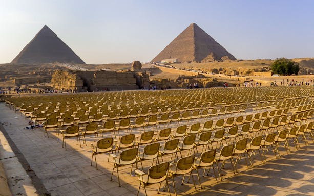 Seats arranged for the Sound and Light Show at the Pyramids of Giza, Cairo, Egypt.
